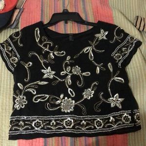 A sheer texture but it has a tank top under